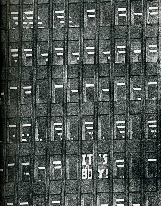 Building with 'It's a Boy!' sign