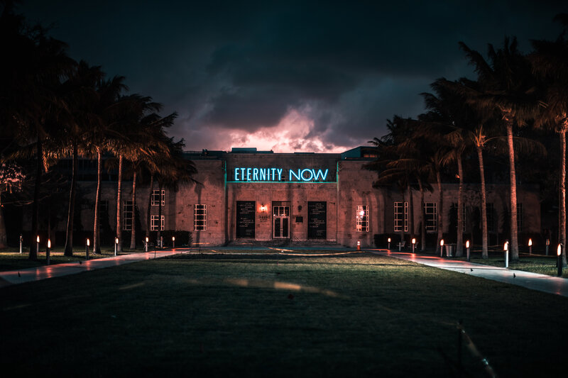Building with Neon Sign — Black