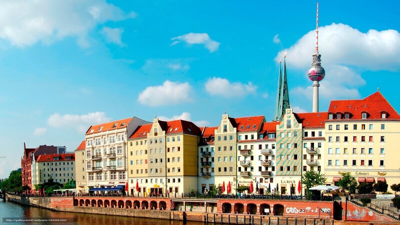 Buildings Along Riverbank — Blue, Bright
