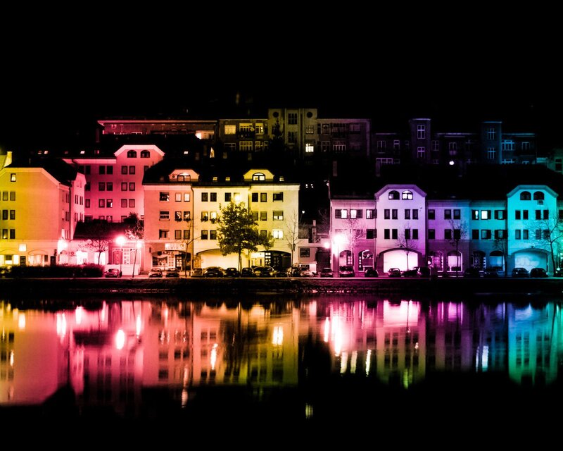 Buildings Along Riverbank — Pink
