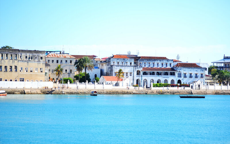 Buildings Along Waterfront — Blue