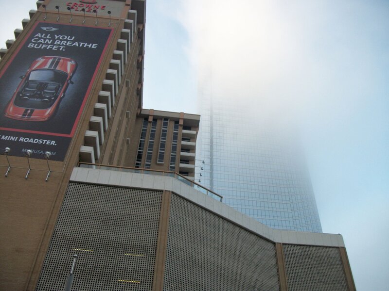Buildings in foggy city