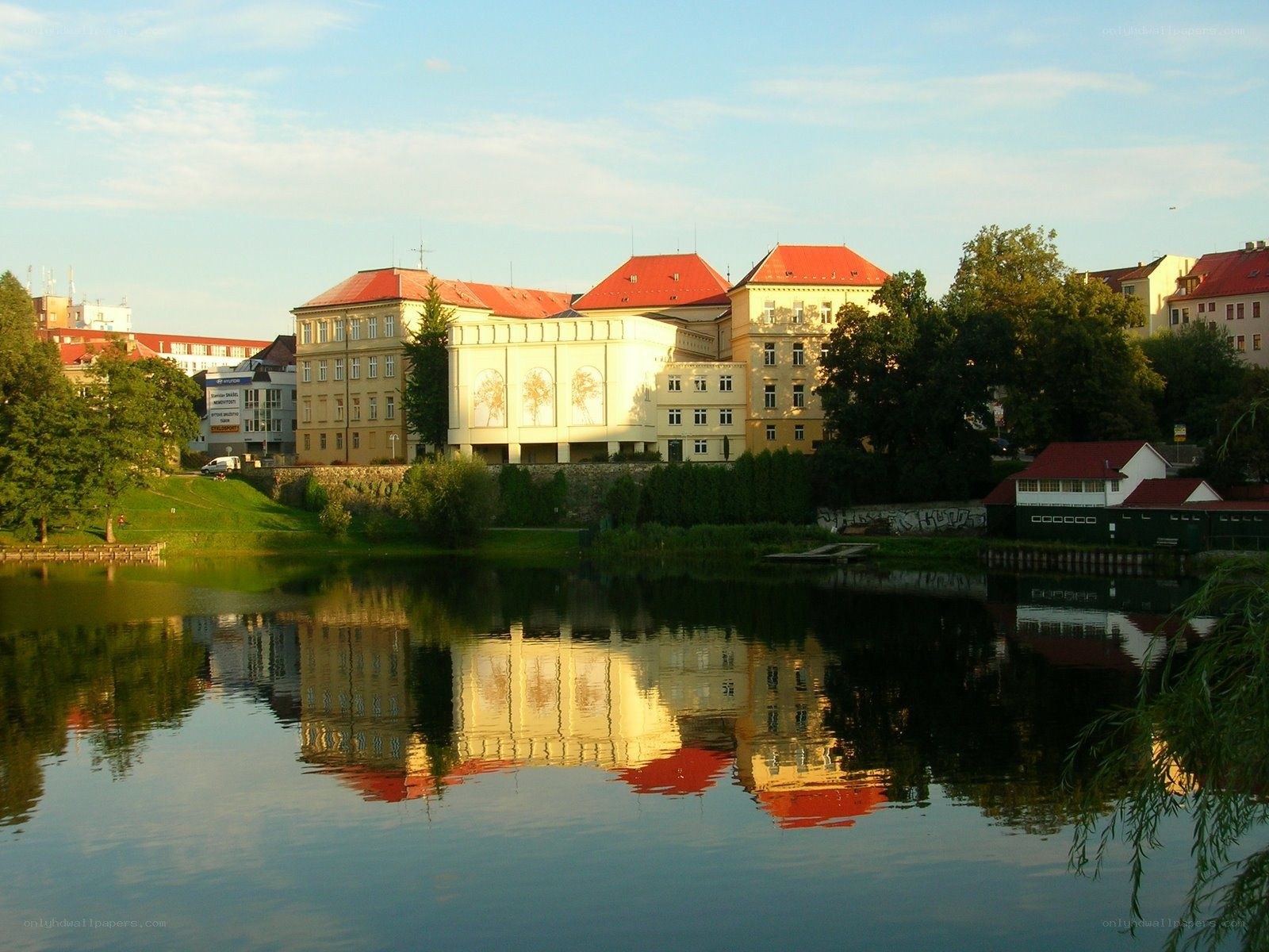 buildings reflected in a lake