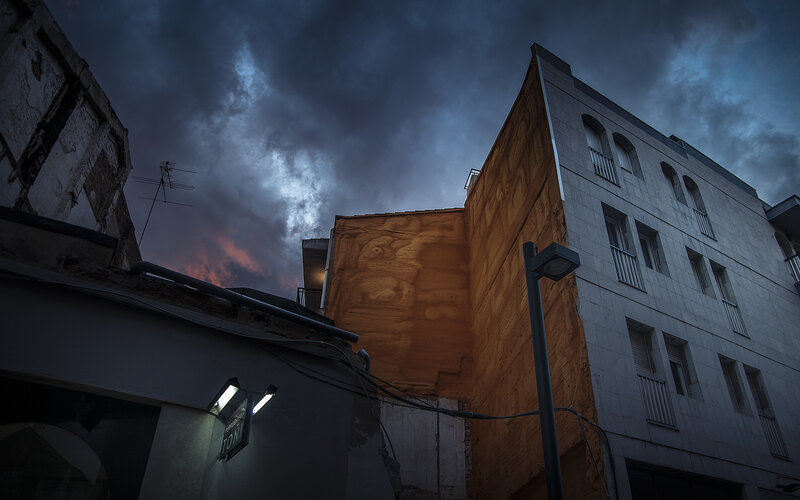 Buildings under Stormy Sky
