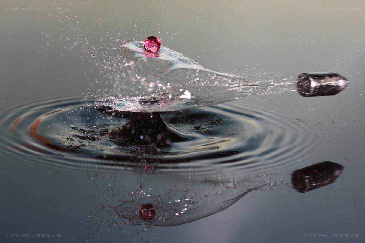 Bullet and gem drop in water
