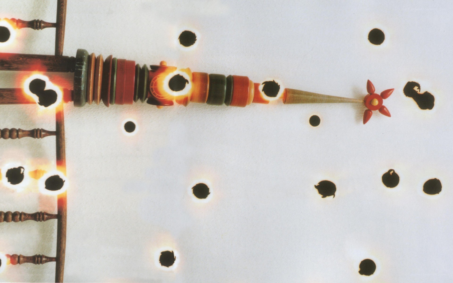 Bullet holes in a wooden object