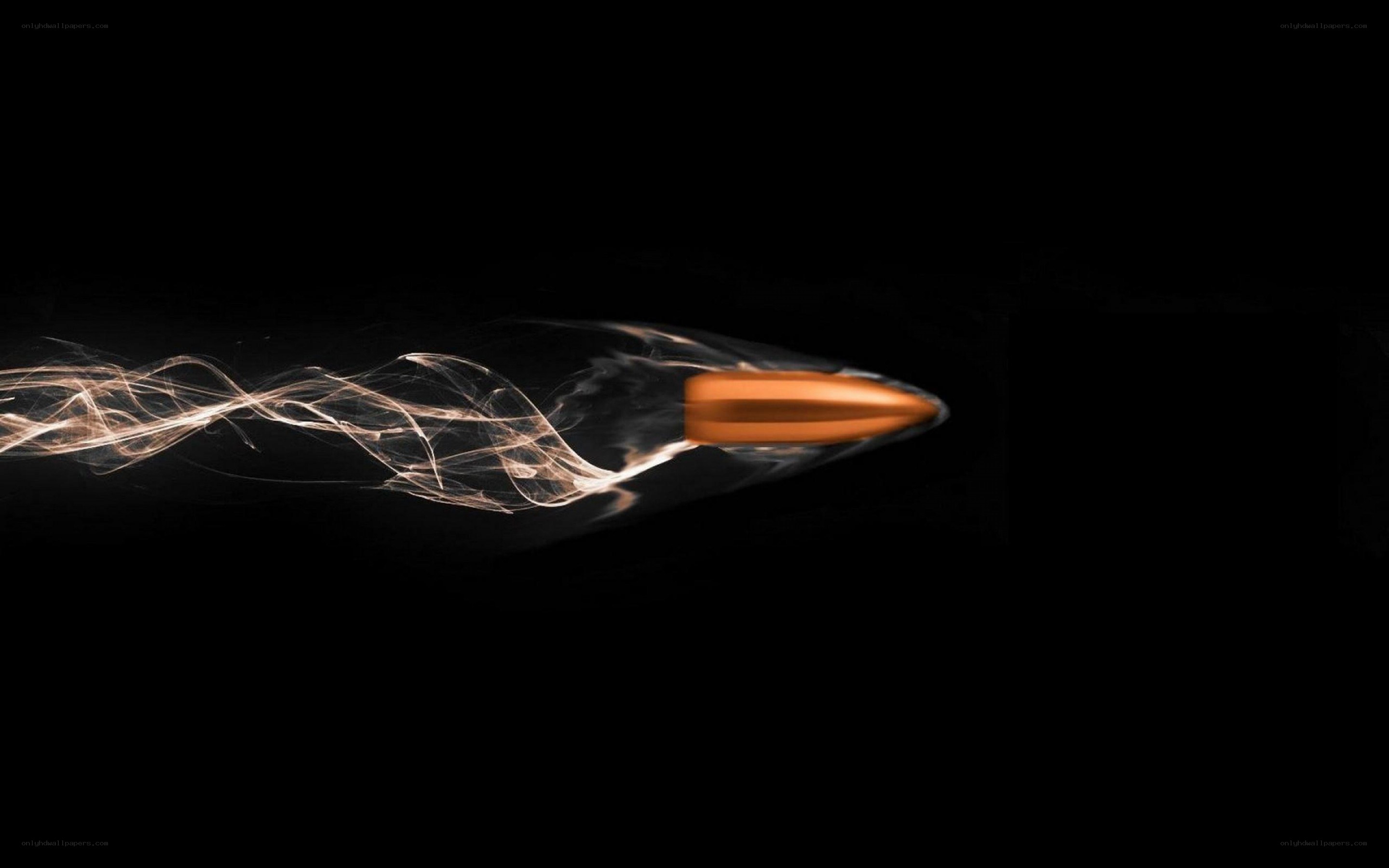 Bullet in motion with smoke trail