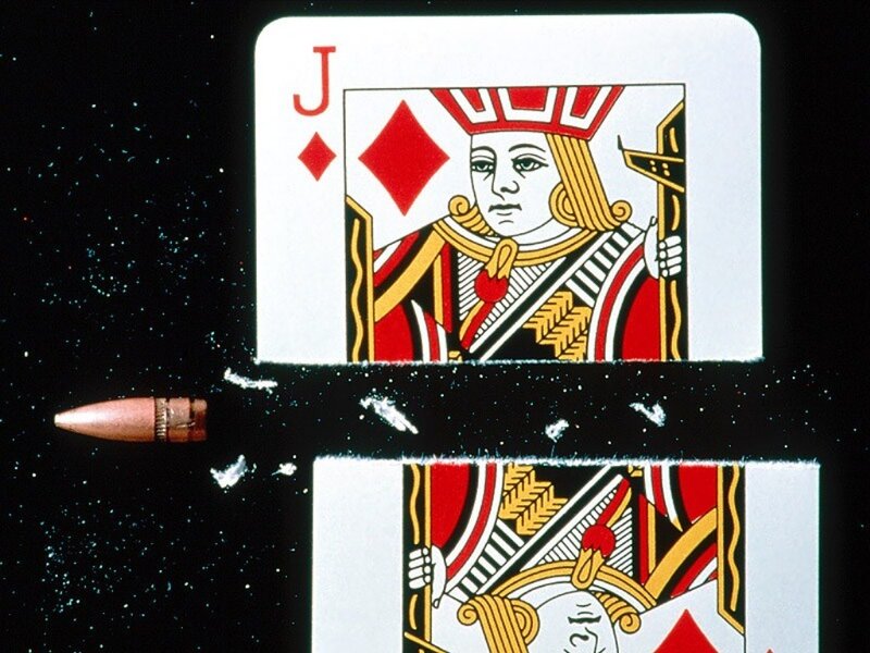 Bullet piercing playing cards