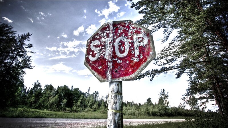 Bullet-riddled Stop Sign — Red