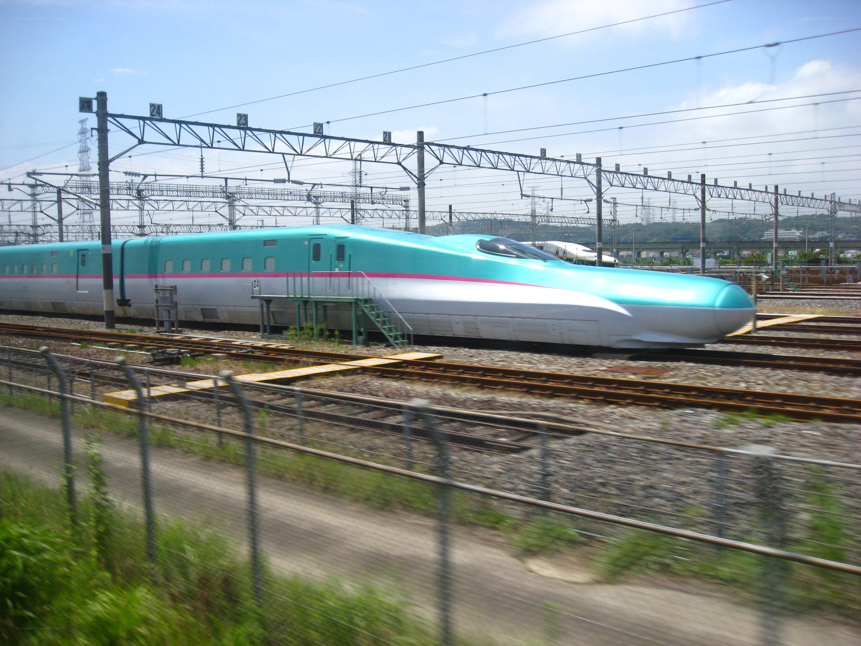 bullet train on railway tracks