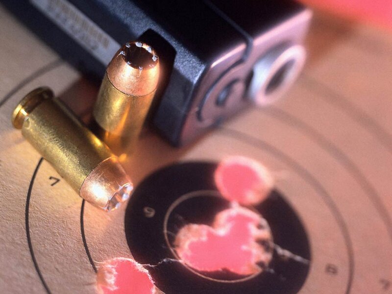 Bullets and target with laser sight