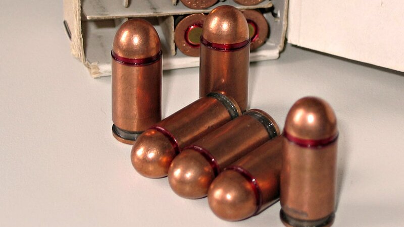 Bullets on a white surface
