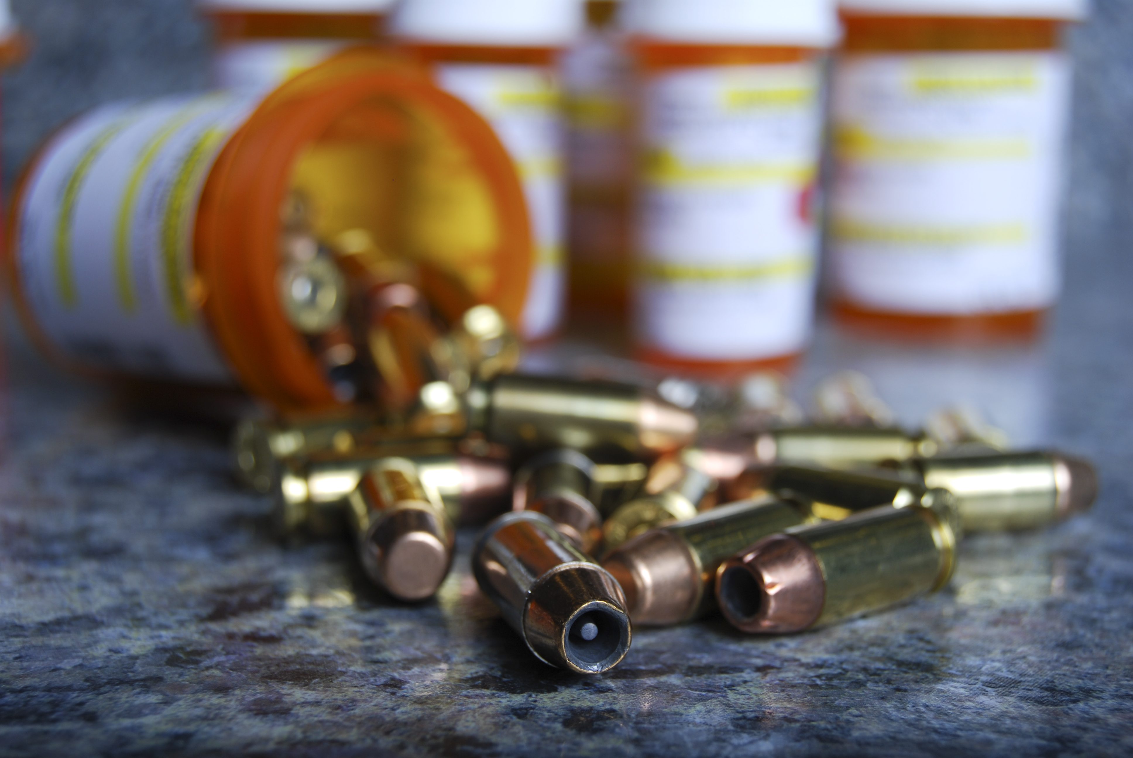 Bullets spilled from pill bottle