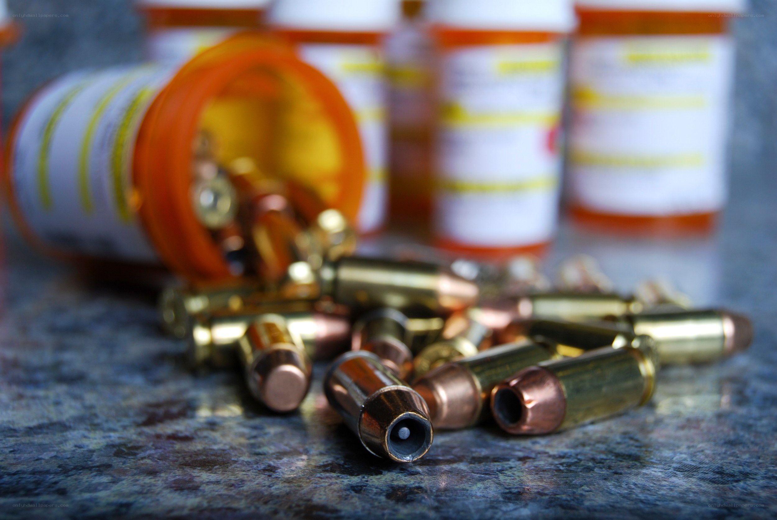Bullets spilled from pill bottle