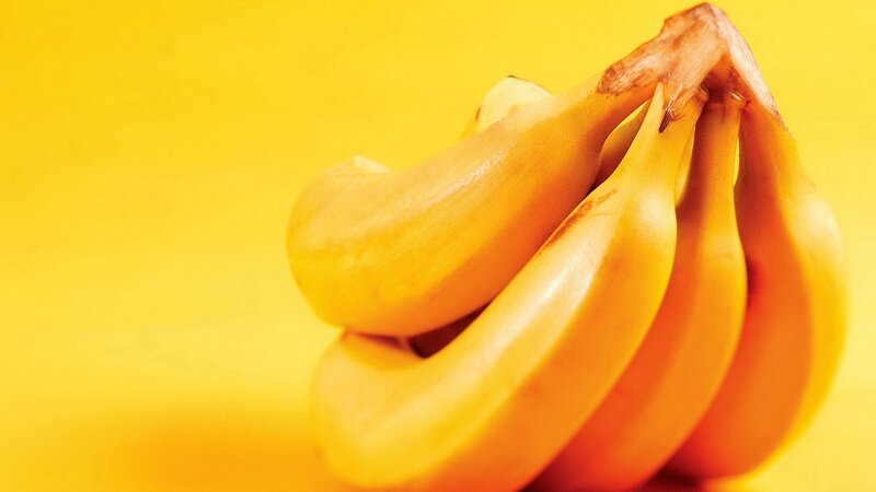 bunch of bananas on yellow