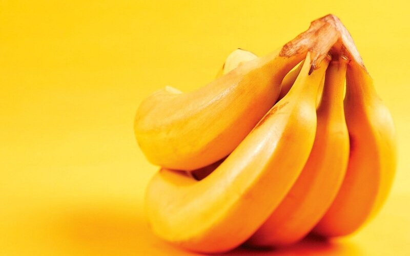 bunch of bananas on yellow
