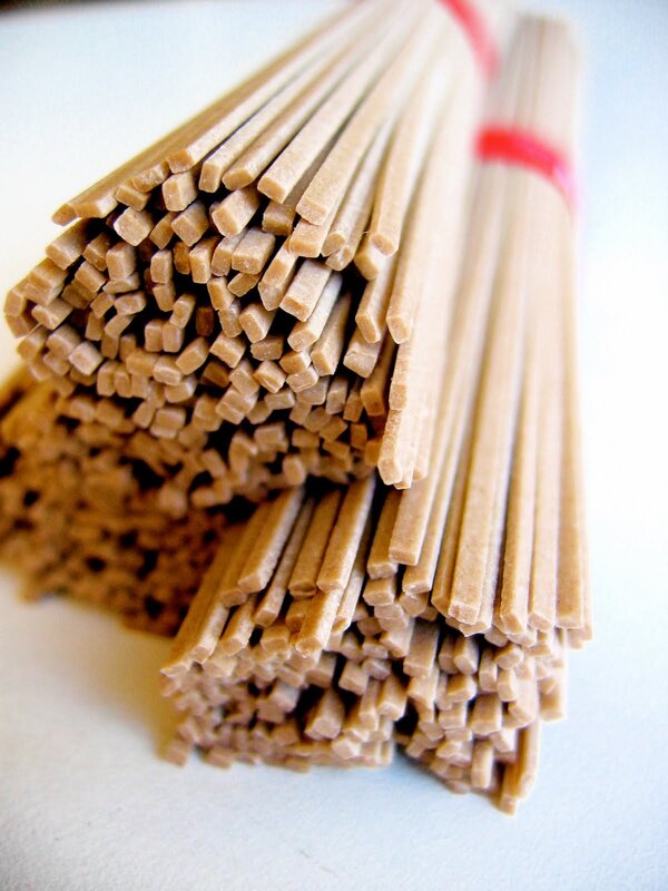 bundles of uncooked soba noodles