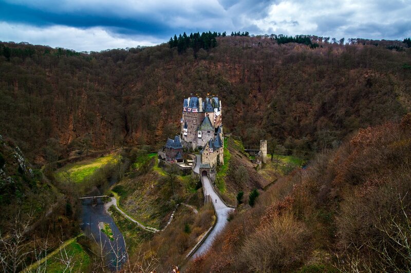 Burg Eltz Castle — Brown, Dramatic, Autumn, Photograph, River, Forest