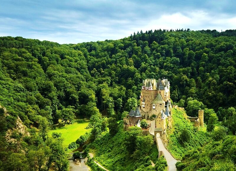 Burg Eltz Castle — Green, Serene, Afternoon, Photograph, Forest, River, Hill