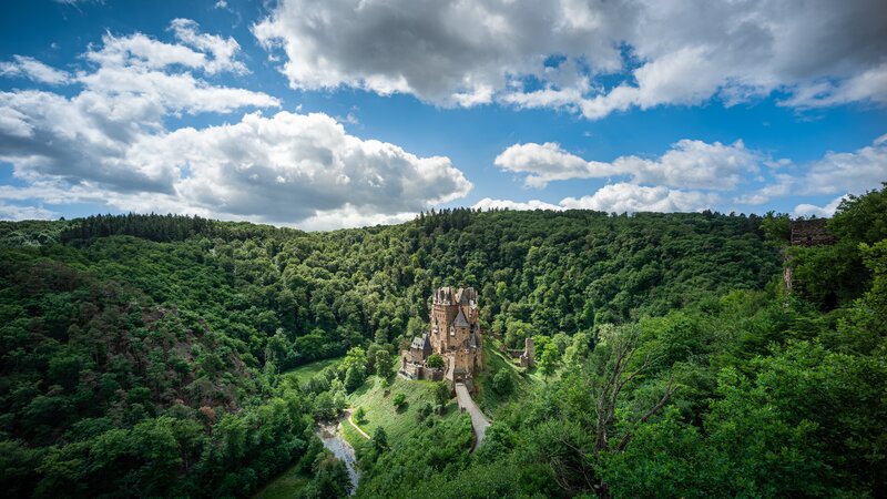 Burg Eltz Castle — Green, Serene, Afternoon, Photograph, Forest, River