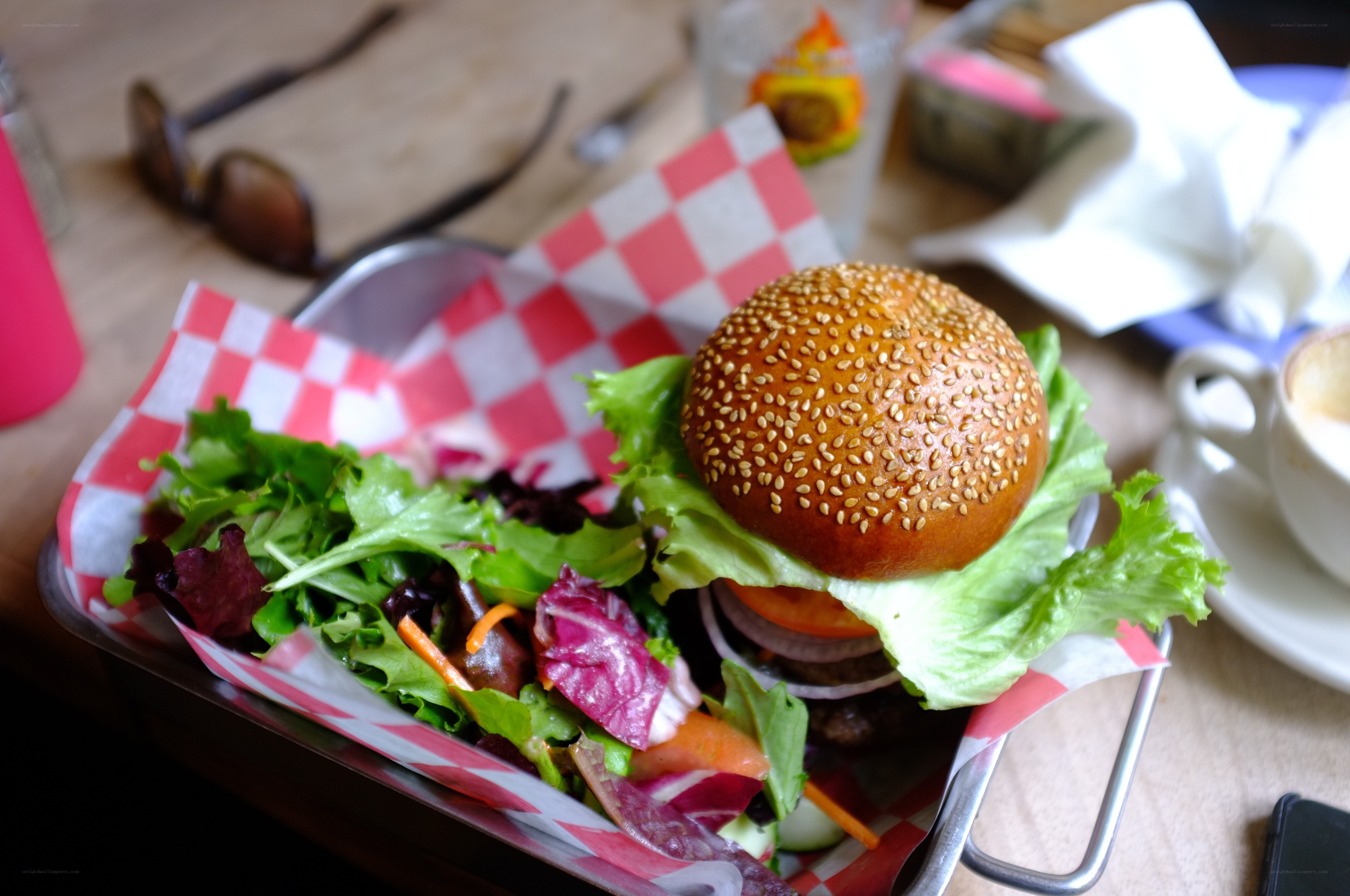 Burger and salad on a tray