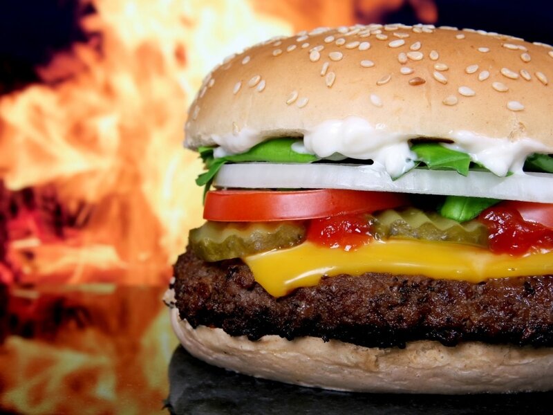 Burger with flames background