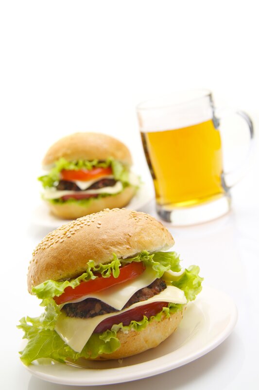 burgers and beer on white