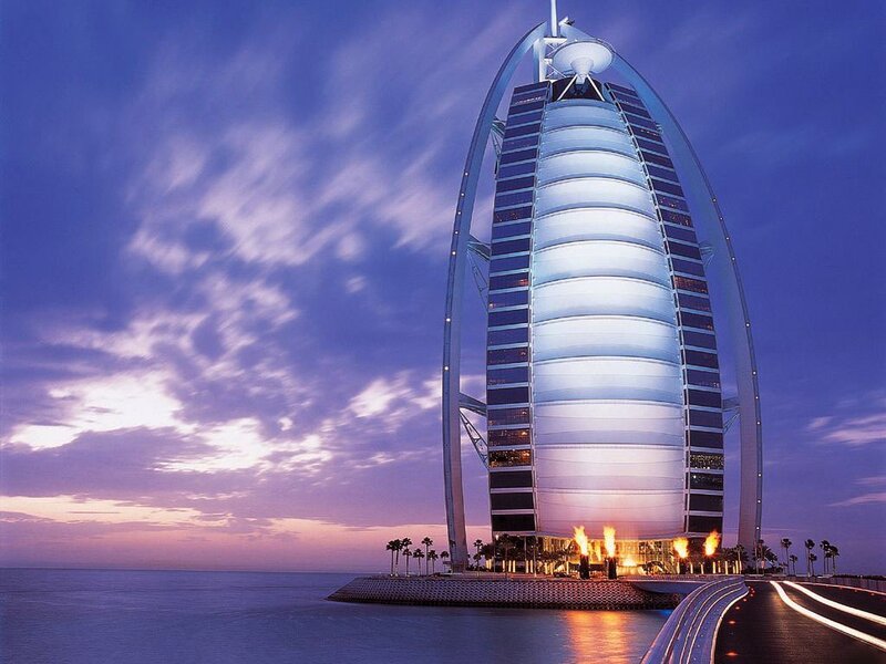 Burj Al Arab Hotel — Blue, Dramatic, Sunset, Photograph, Ocean, Palm Trees, Fire Torches