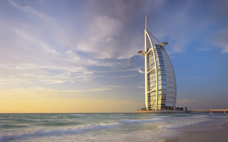 Burj Al Arab Hotel — Blue, Serene, Sunset, Photograph, Ocean, Sky, Beach, White, Yellow