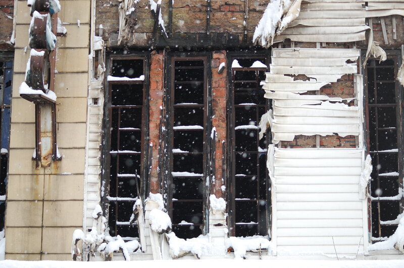 Burned building in snow