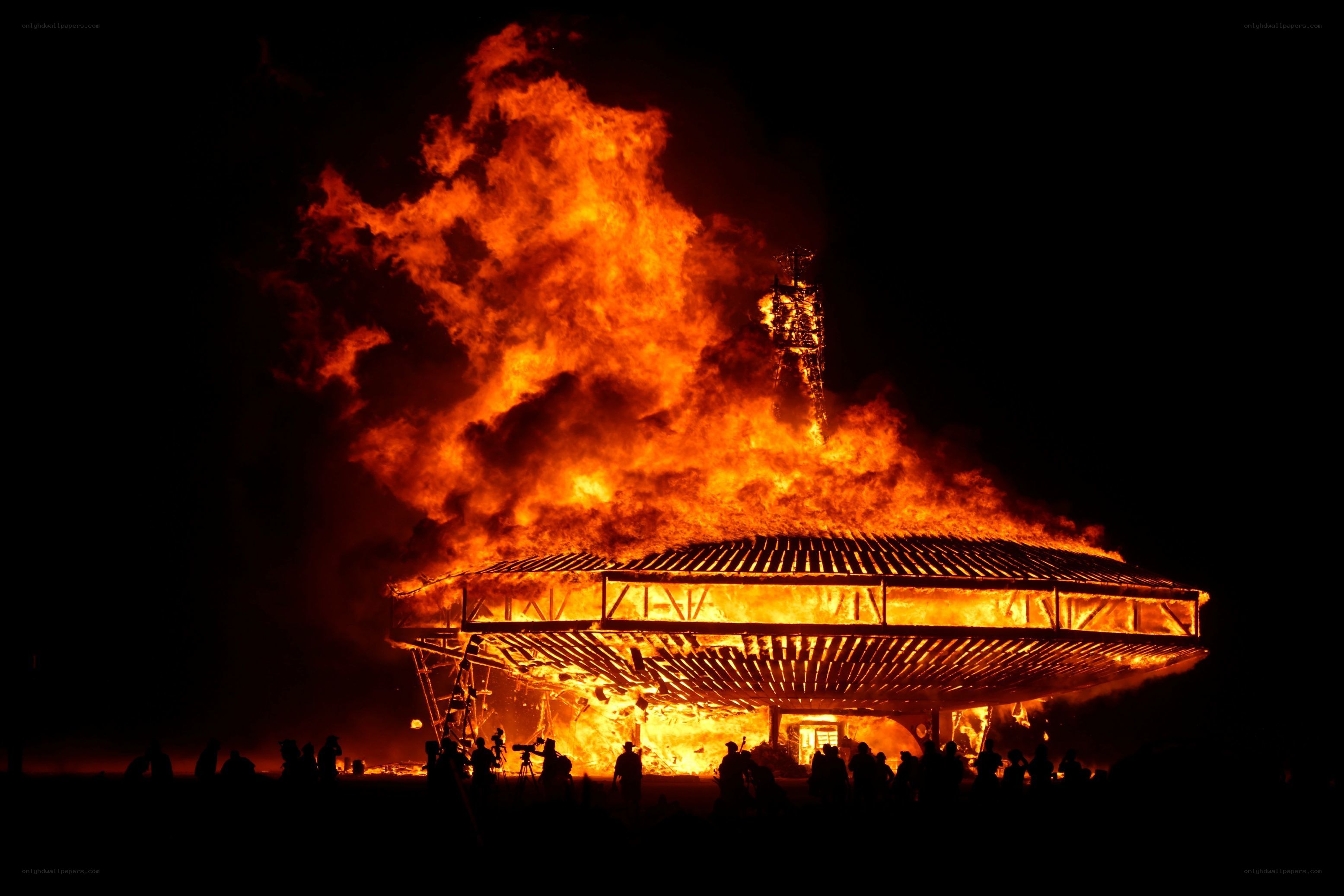 Burning art installation at night