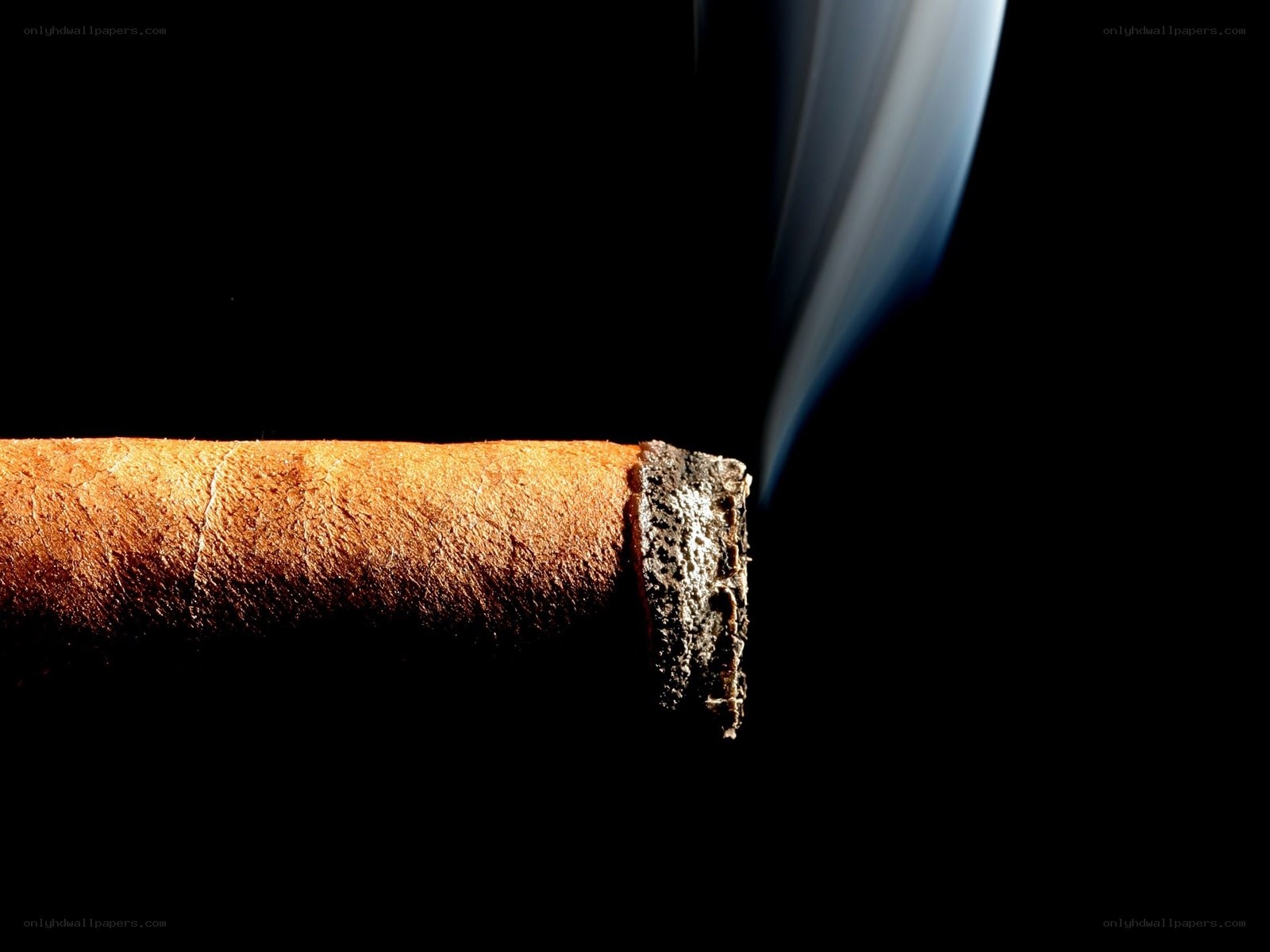 burning cigar with smoke