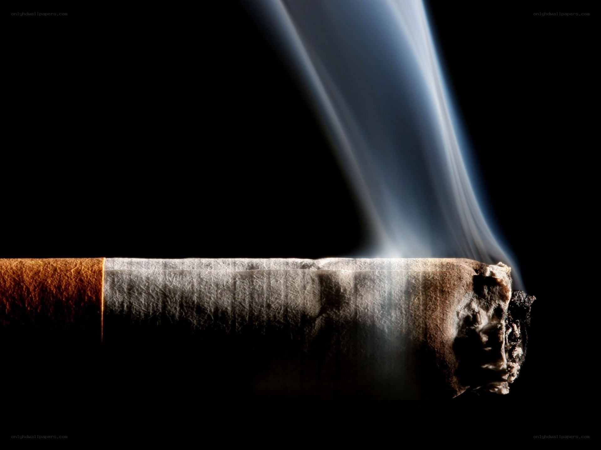 burning cigarette with smoke