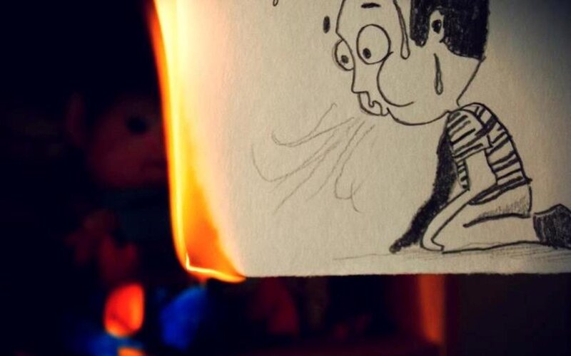 Burning Drawing of a Boy