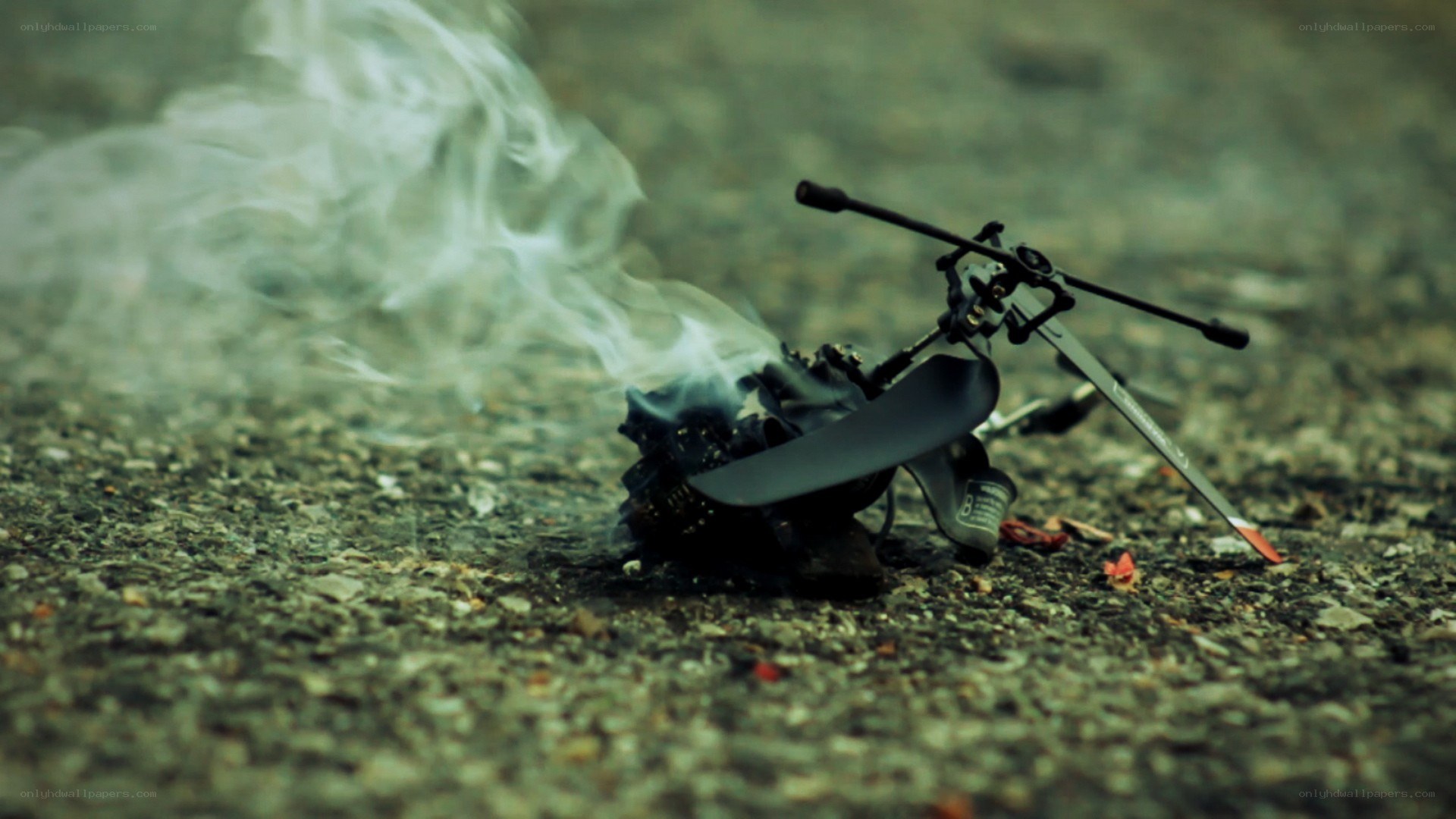 burning drone on ground