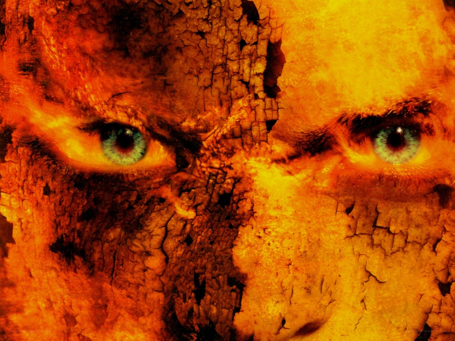 burning face with green eyes