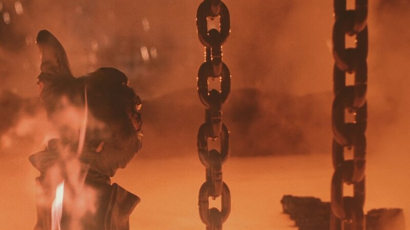 Burning Figure in Chains