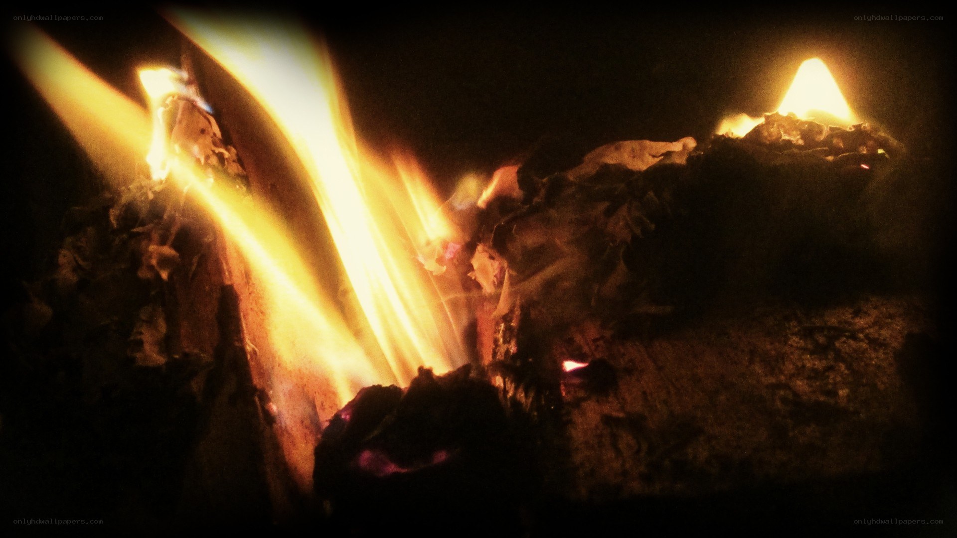 burning firewood at night