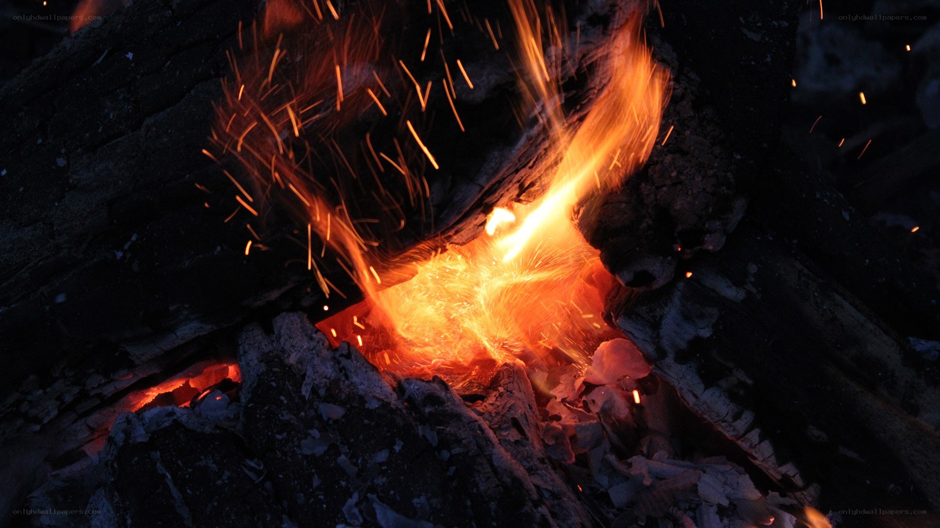 burning firewood at night