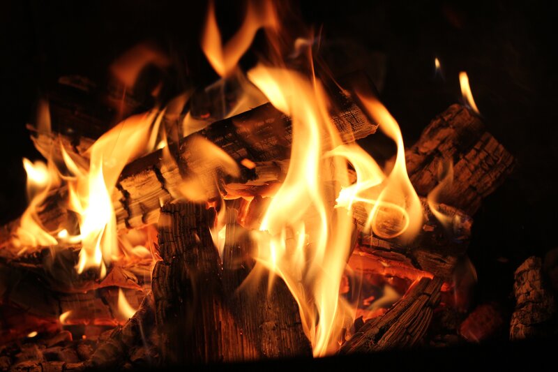 burning firewood in a fireplace