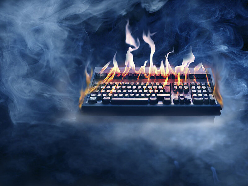burning keyboard with smoke