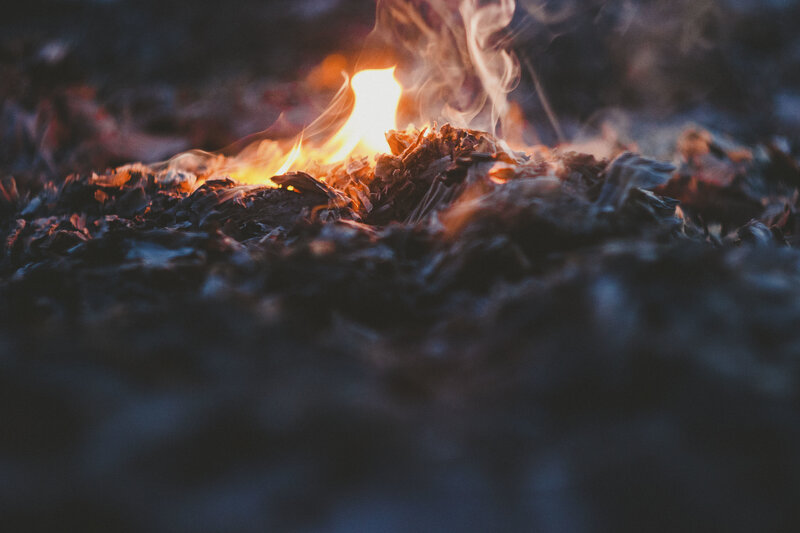 burning leaves in the dark