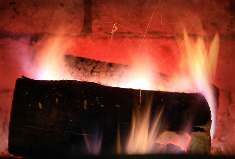 Burning Log in Fireplace