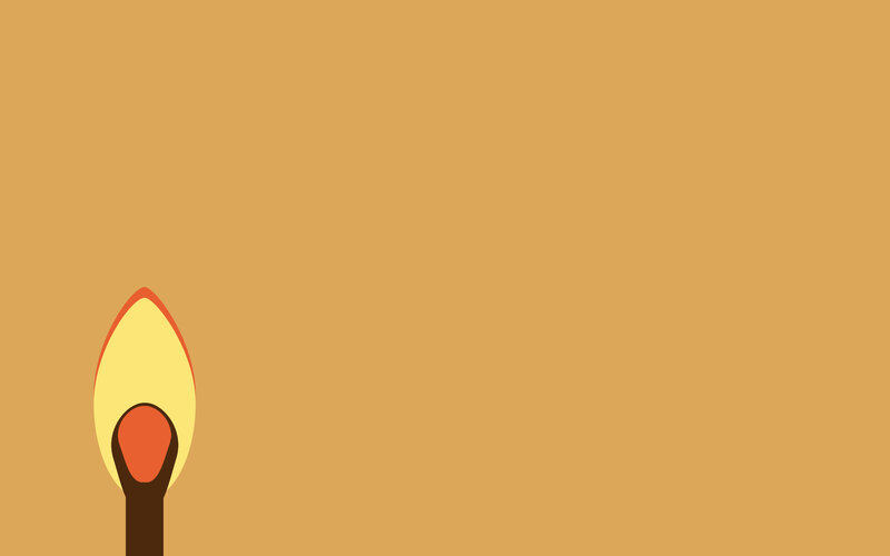 burning match on brown background
