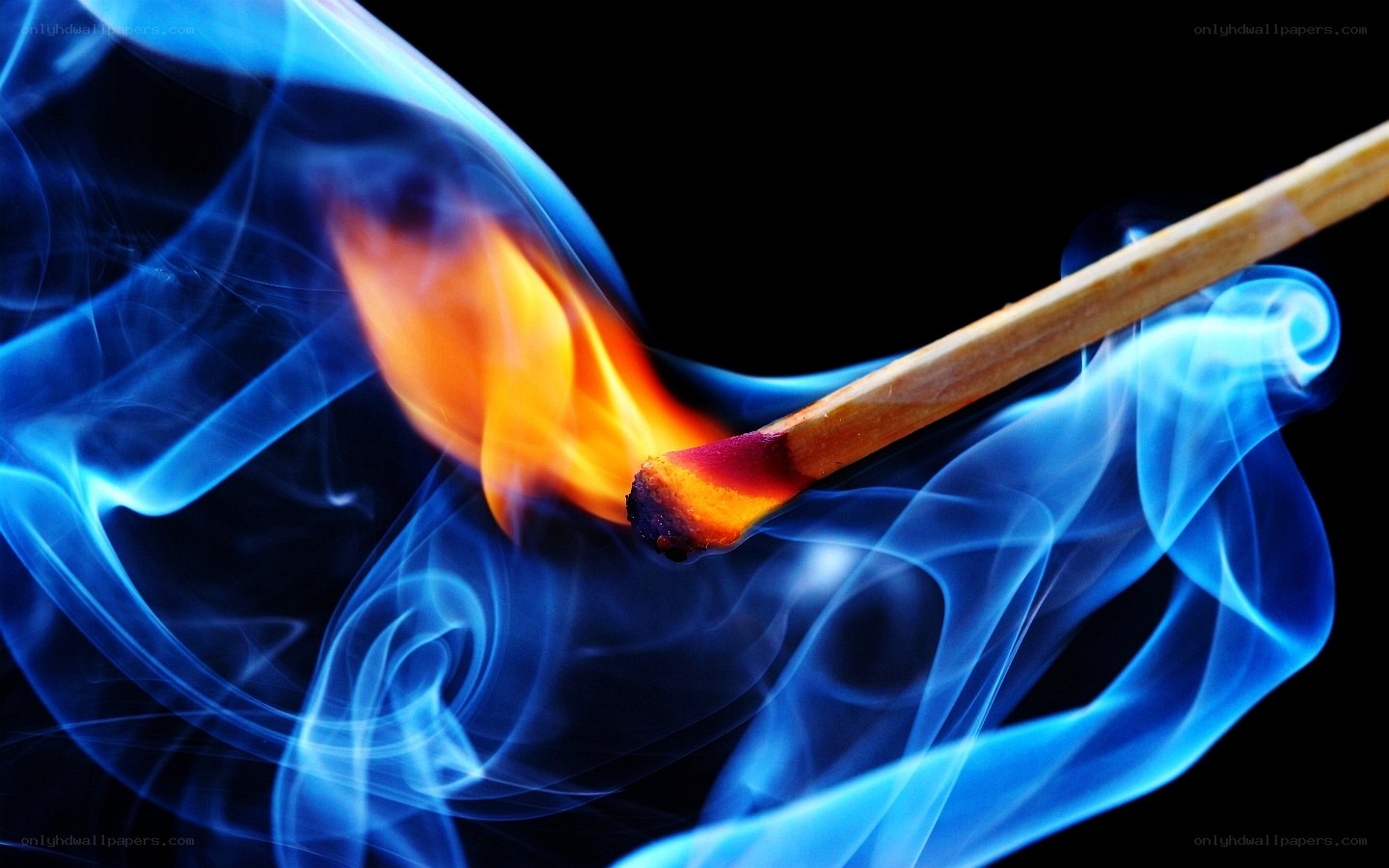 Burning match with blue smoke