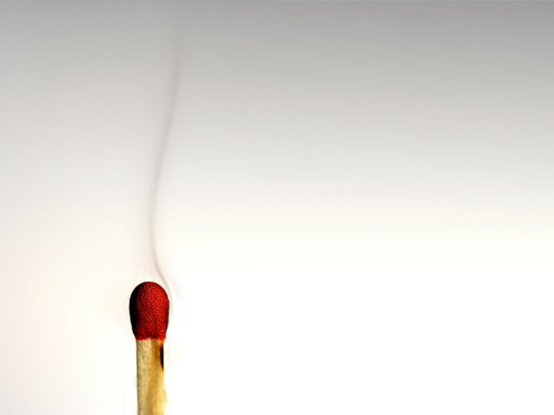 burning match with smoke