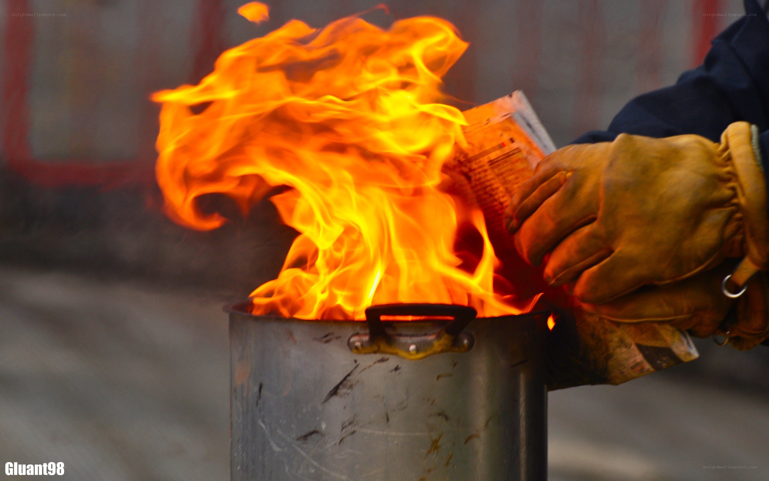 Burning paper in a metal can