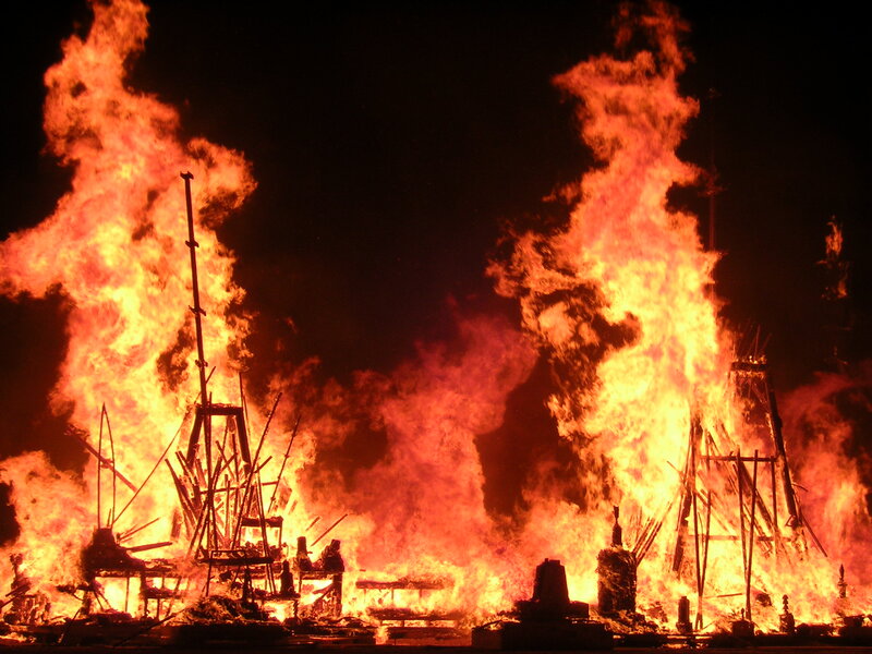 Burning ship structures at night