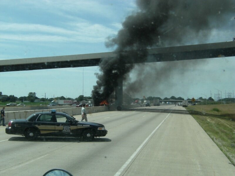 Burning Vehicle on Highway