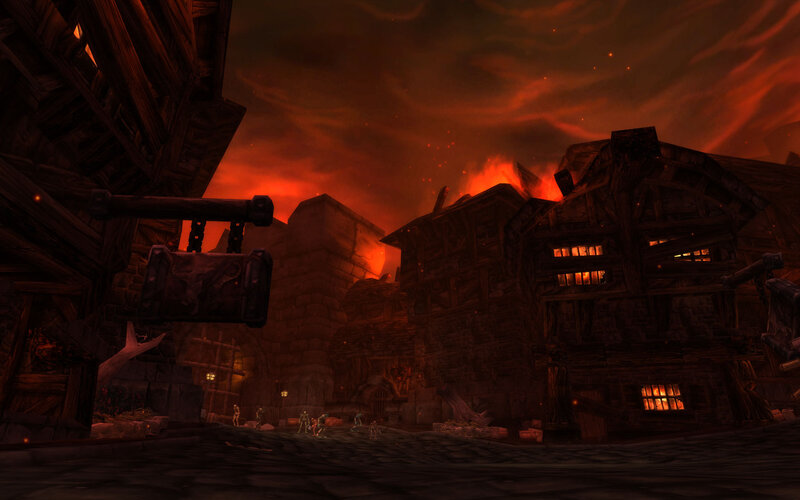 burning village at dusk